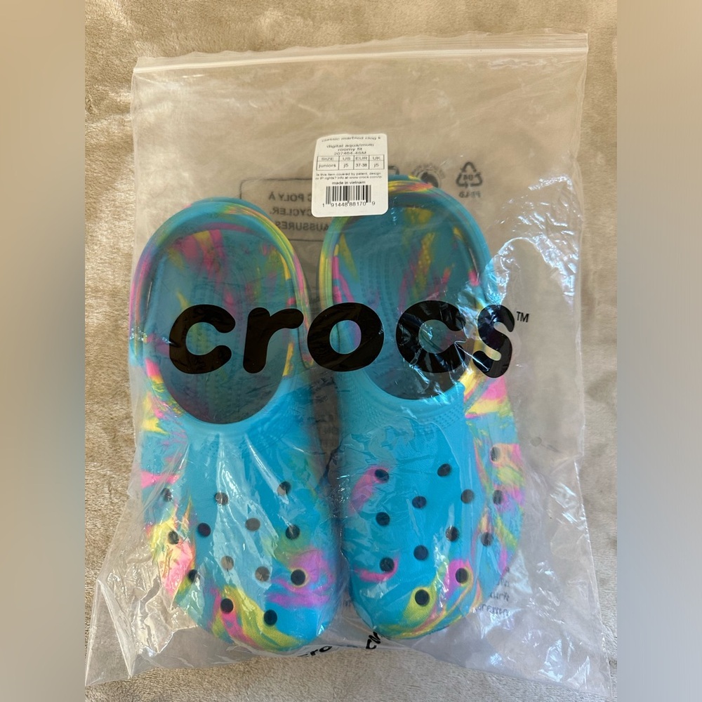 Crocs, kids size J5. Digital aqua color.